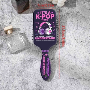Purple K-pop themed air cushion massage hairbrush with music element illustrations