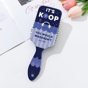 Blue and purple gradient air cushion massage hairbrush with K-pop inspired graphic design