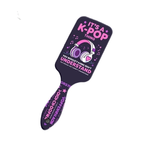 K-pop themed air cushion hairbrush with blue base and pink decorative musical patterns