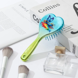 Heart shaped hair brush with rainbow butterfly print and blue gradient electroplated finish