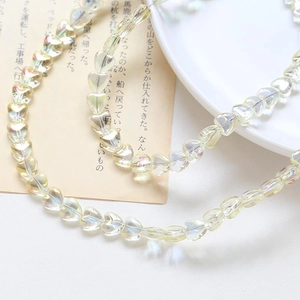Macro shot of heart-shaped crystal beads with aurora AB coating for DIY jewelry making
