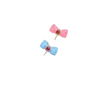 Charming bow-knot earrings with red heart stones in pink and blue on white background