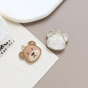 Detailed front and back views of bear alloy charm for DIY jewelry and necklaces