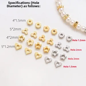 Detailansicht der 14k vergoldeten Herz- und Sechskant-Abstandshalter für DIY-Schmuck