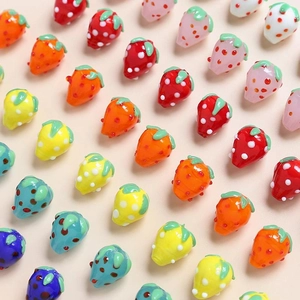 Colorful handmade glass strawberry beads in various colors for DIY jewelry making