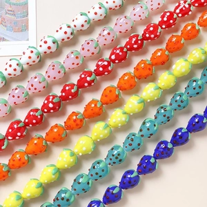 Colorful glass strawberry beads for DIY jewelry making in multiple vibrant colors