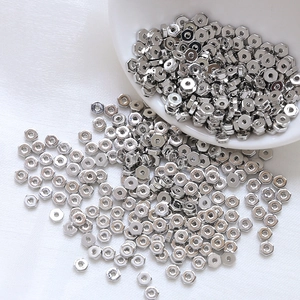 Macro shot of silver hexagonal metal spacer beads for DIY jewelry and bracelet making