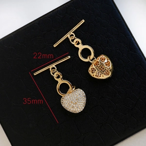 Detail view of 18k gold plated heart OT toggle clasp with clear zircon and dimensions
