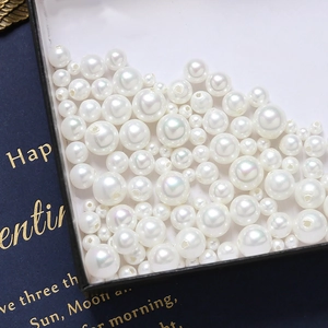 Lustrous white round faux pearls with single holes for DIY jewelry making and earrings