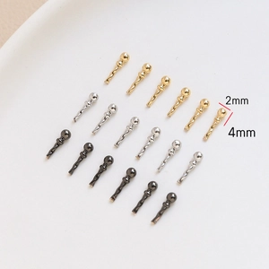 Macro detail of 2mm ball-head textured metal pins in gold, silver, and black finish