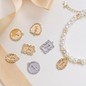 Vintage rose embossed metal charms in gold and silver for DIY jewelry making