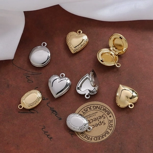 Vintage style gold and silver locket pendants in heart, oval and round shapes with engraving