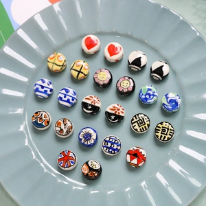 Variety pack of hand-painted ceramic beads for DIY jewelry making with floral patterns
