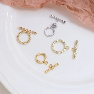 Fermoirs à bascule OT dorés et argentés pour bijoux DIY sur plateau en céramique
