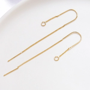 Detail of 14K gold plated U-shaped ear threader with delicate chains and small rings
