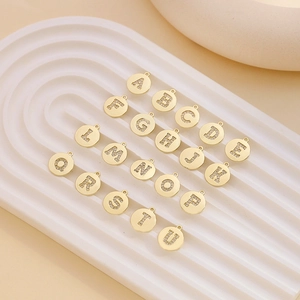 Gold plated circular letter pendants with micro-set zircon stones for DIY jewelry making