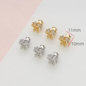Detailansicht von 11x10mm Sternanhängern in Gold und Silber mit Zirkonia-Verzierung