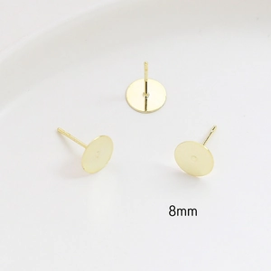 Macro shot of 8mm gold-plated flat stud earrings components with S925 silver pins