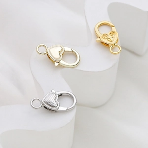 Fermoirs mousquetons cœur dorés aux motifs lisses, rayés et floraux pour bijoux DIY
