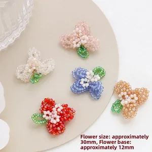 Detail view of 30mm handmade beaded crystal glass flowers for DIY hair accessories