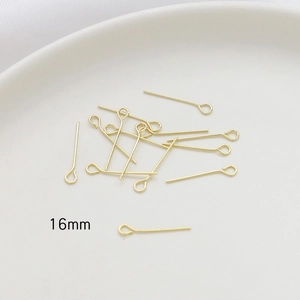 Macro detail of 16mm gold plated 9-shaped eye pins for DIY jewelry making accessories