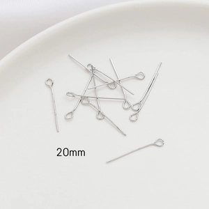 Macro shot of 20mm silver plated eye pins jewelry connectors for DIY crafting projects