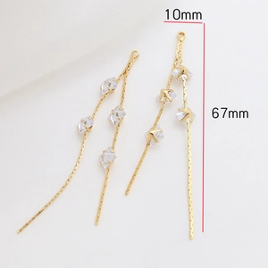 Détail du pendentif nœud doré de 67mm serti de zircons pour la création de bijoux DIY