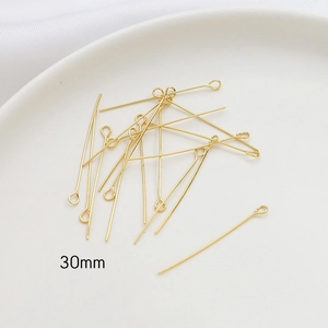 Detailed view of 30mm 14k gold-plated eye pins for DIY jewelry making accessories