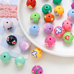 Colorful acrylic beads with hearts and stars patterns for DIY jewelry making