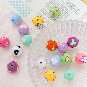 Mixed colorful acrylic macaron beads with star and heart patterns for DIY jewelry making