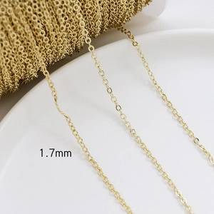 Macro detail of 1.7mm gold plated brass O-chain links for DIY jewelry making