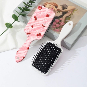 Brosses à cheveux avec motif fraise et coussin d'air pour massage et coiffage doux