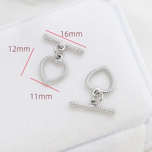 Détail macro du fermoir à bascule en forme de cœur avec barre en T de 16mm pour bijoux
