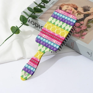 Detail of colorful bohemian pattern on wide-tooth air cushion hairbrush with massage pins