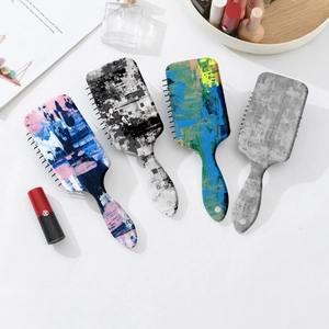 Set of four ergonomic air cushion massage hairbrushes with colorful graffiti marble patterns