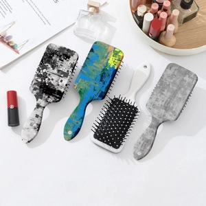 Set of four massage air cushion hair brushes with marble and abstract graffiti prints