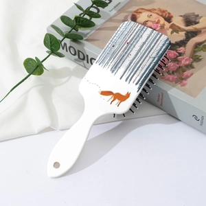 Détail de l'imprimé renard de forêt sur brosse à cheveux à coussin d'air blanc avec trou