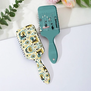 Retro mid-century air cushion hairbrushes with black cat prints and soft scalp massage pins