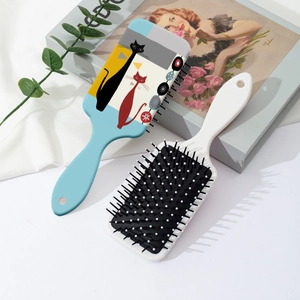 Mid-century modern abstract cat print hair brush with massaging air cushion bristles