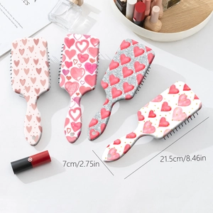 Set of four heart pattern air cushion hair brushes for scalp massage and volume