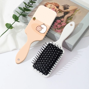 Set of two cute cartoon animal hair brushes with air cushion massage and paddle design