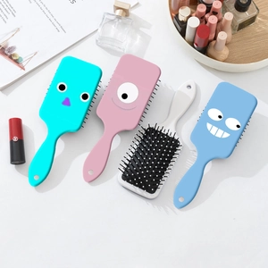 Colorful cartoon big eye cushion hairbrushes set with massage bristles for scalp care