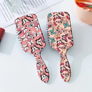 Set di spazzole per capelli con farfalle e cuscinetto massaggiante in rosa e beige