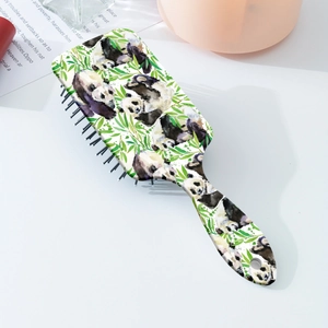 Detail of the air cushion hairbrush with cute panda and bamboo print and hanging hole