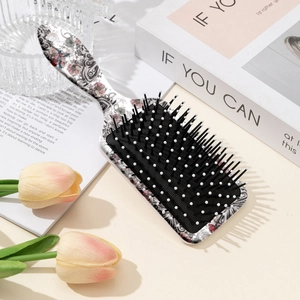 Brosse à cheveux rectangulaire avec motifs de papillons et fleurs rouges imprimés