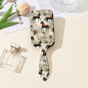 Close-up of hairbrush with horse print design among aesthetic lifestyle props