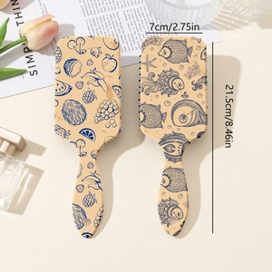 Floral and marine print cushion hairbrush set with dimensions 21.5cm by 7cm