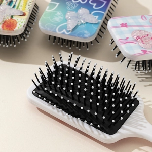 Floral print air cushion massage hairbrushes with 3D bows and heart patterns