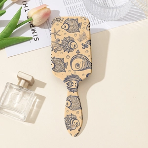 Detail of fruit and ocean series massage hairbrush with blue marine patterns