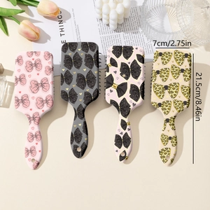 Lot de quatre brosses à cheveux à coussin d'air avec imprimé nœud pour démêlage